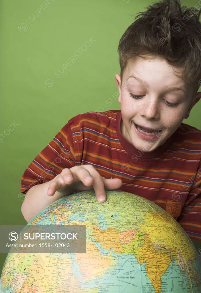 boy, globe, contemplating, gesture, shows, smiling, portrait,   Series, 10 years, child, globe, teaching material, looking at,  Interest, inquisitive,...