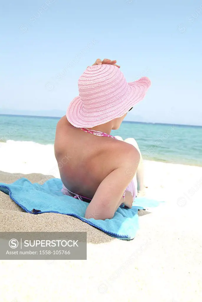 Woman, young, sea-gaze, back-opinion, beach, lies, people, 20-30 years, hat, sunhat, headgear, towel, lookout, sea, sand, sandy beach, shadows, sunbat...