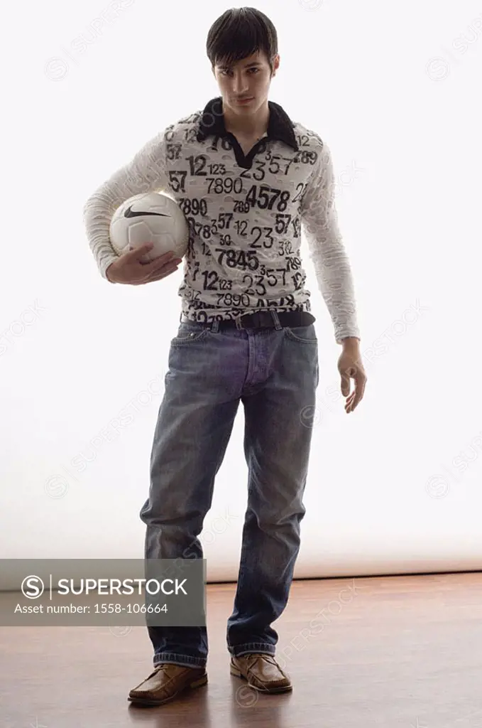 Teenager, football, holds, no property release, series, people, man, young, 15-20 years, dark-haired, hairdo, trendy, beard, beard-fuzz, cool, casual,...
