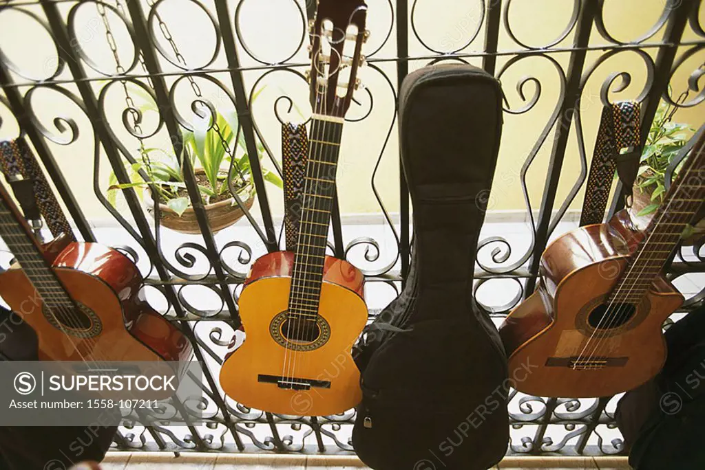 Cuba, Camagüey, balcony-hand-rails, detail, guitars, balcony, hand-rails, music-instruments, instruments, hangs, side by side, symbol, music, guitar-m...