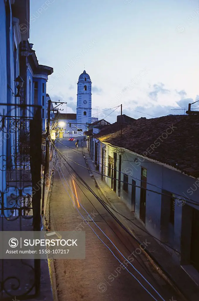 Cuba, Sancti spirits, center, Maximo Gomez street, church Espiritu Santo, twilight, Central America, city, alley, street-scene, houses, parish-church,...