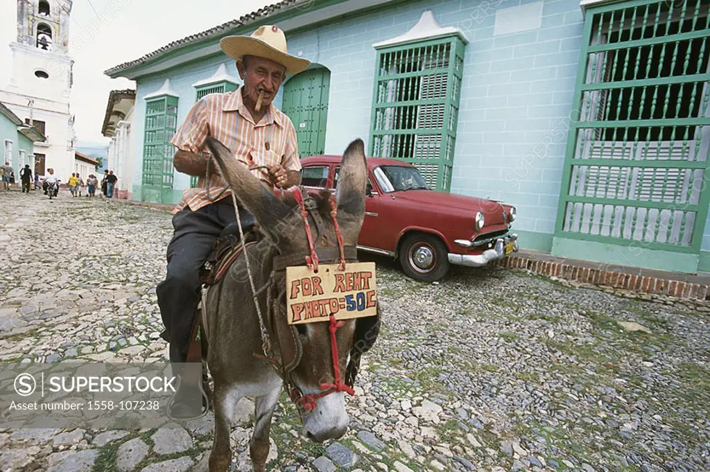 Cuba, Trinidad, Plaza mayor, senior, donkeys, rides, no models people, man, Cubans, 60-70 years, release, Central America, hat, straw hat, mount, usef...