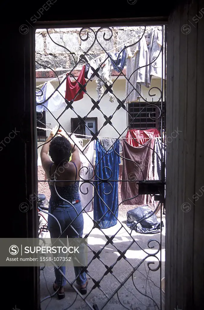 Cuba, Cardenas, center, backyard, woman, laundry, back-opinion, hangs up no release, Central America, models door, puts bars on, gaze, yard, natives, ...