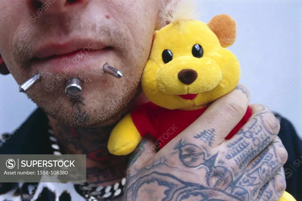 Man, face, gepierct, hand, plush-animal, tattoos holds, close-up, people, 20-30 years, chin, chin-area, Piercings, body-jewelry, Skinhead Art, Body ty...