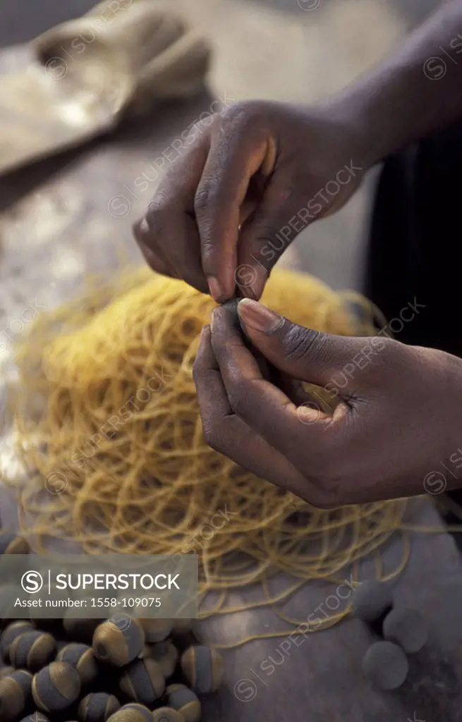 Man, people of color, detail, hands, pearls, beeswax, Africa, wraps black-Africa, economy craft craftsmanship handicraft manufacture, handicraft, skil...