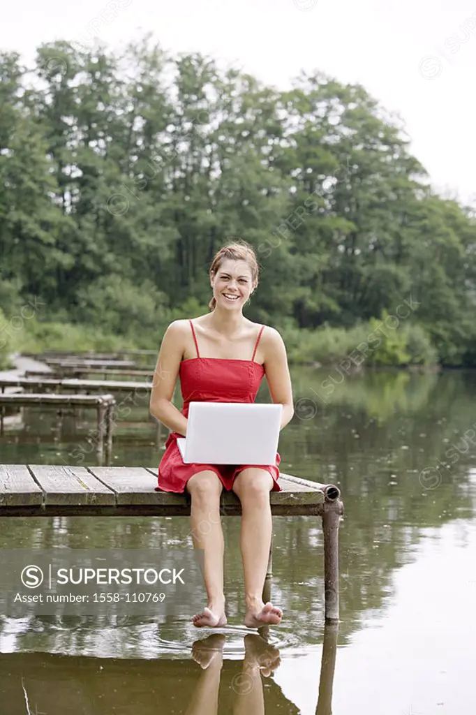 Woman, young, cheerfully, laptop, bridge, sits, series, people, quite-bodies 24 years 20-30 years, smiles, gaze camera, brunette, long-haired, ponytai...