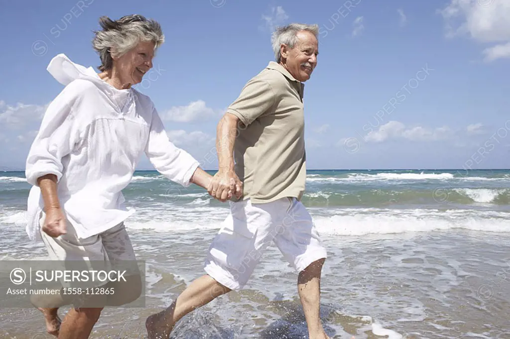 Beach, senior-pair, hand in hand, water, shallow, runs, cheerfully, detail, series, people, seniors, pair, 60-70 years, barefoot, leisurewear, happily...
