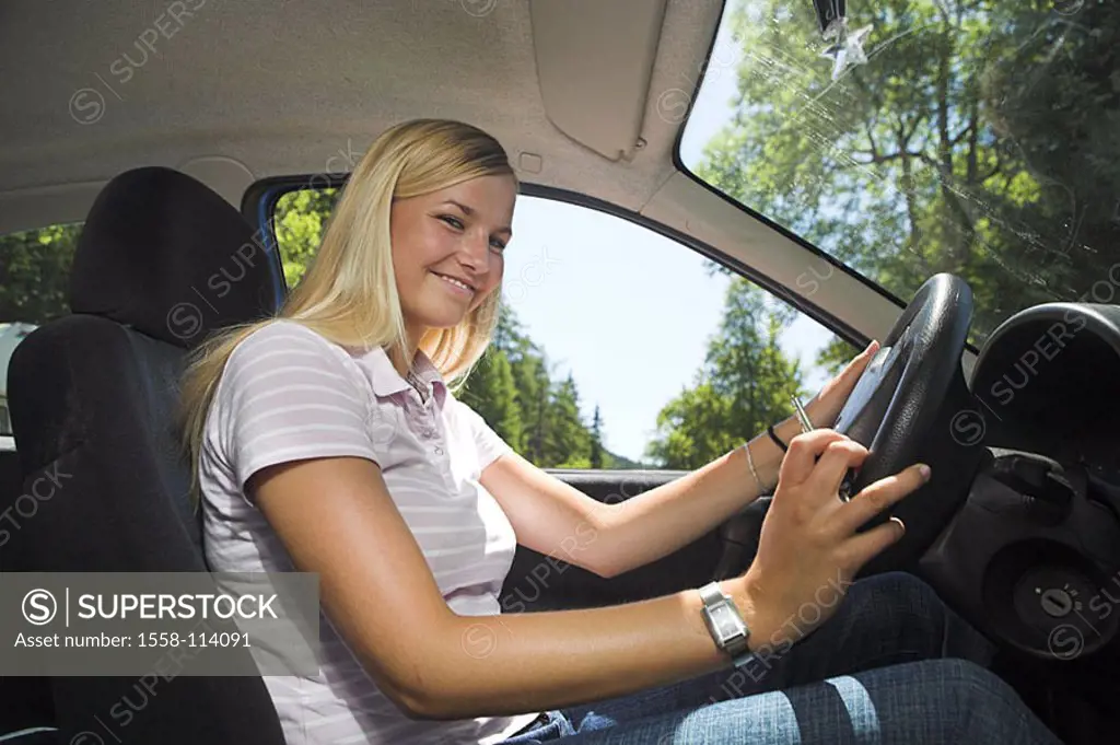 Woman, young, happily, ignition keys, holds, car, sits, at the side, series, people, teenagers, teenagers, 18 years, blond, long-haired, driving-begin...