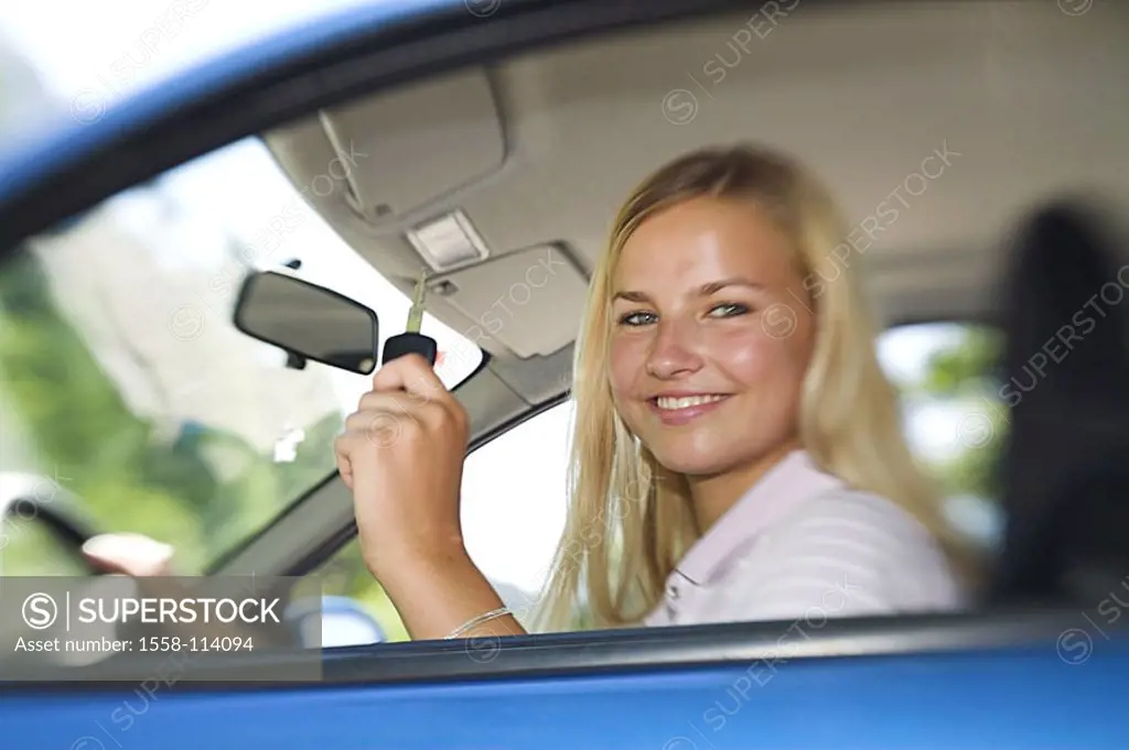 Woman, young, happily, ignition keys, holds, car, sits, at the side, fuzziness, series, people, teenagers, teenagers, 18 years, blond, long-haired, dr...