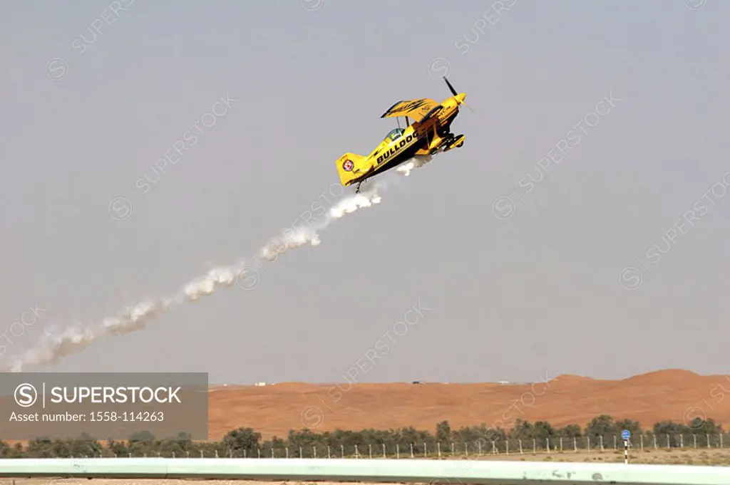 Propeller-airplane, start, 2006 Al Ain air-shows, Arabic emirates, only editorially, Babylon-Freefly S L , flight-show, art-planes, smoke, heavens, ac...