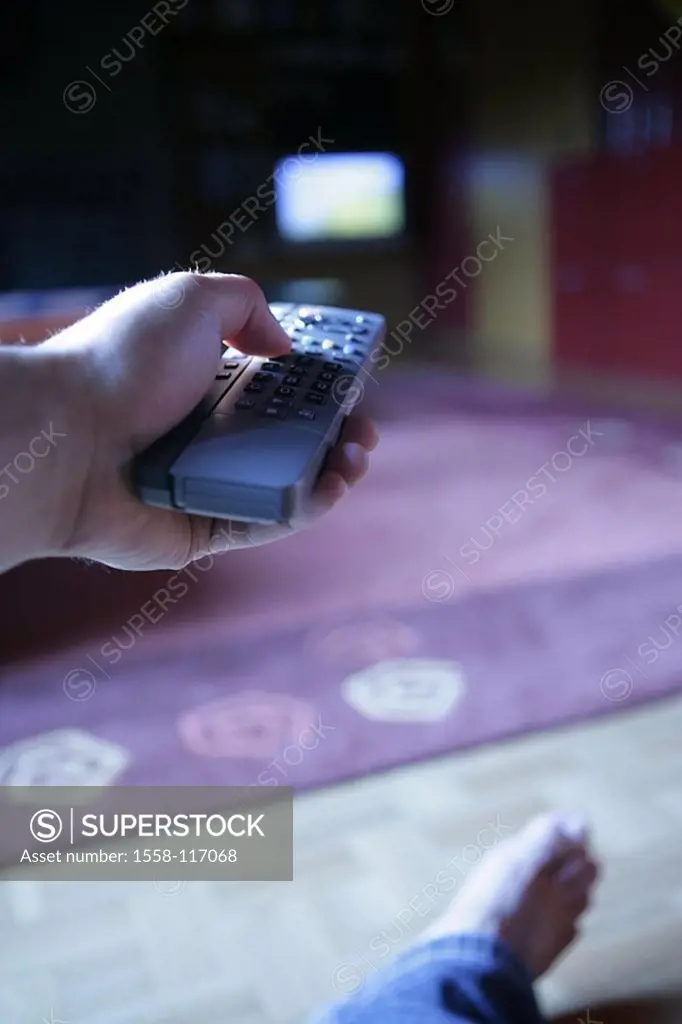 Living rooms, man, television, detail, hand, long-distance-service, gesture, people, sits, jeans, barefoot, television set television-program, zappen,...