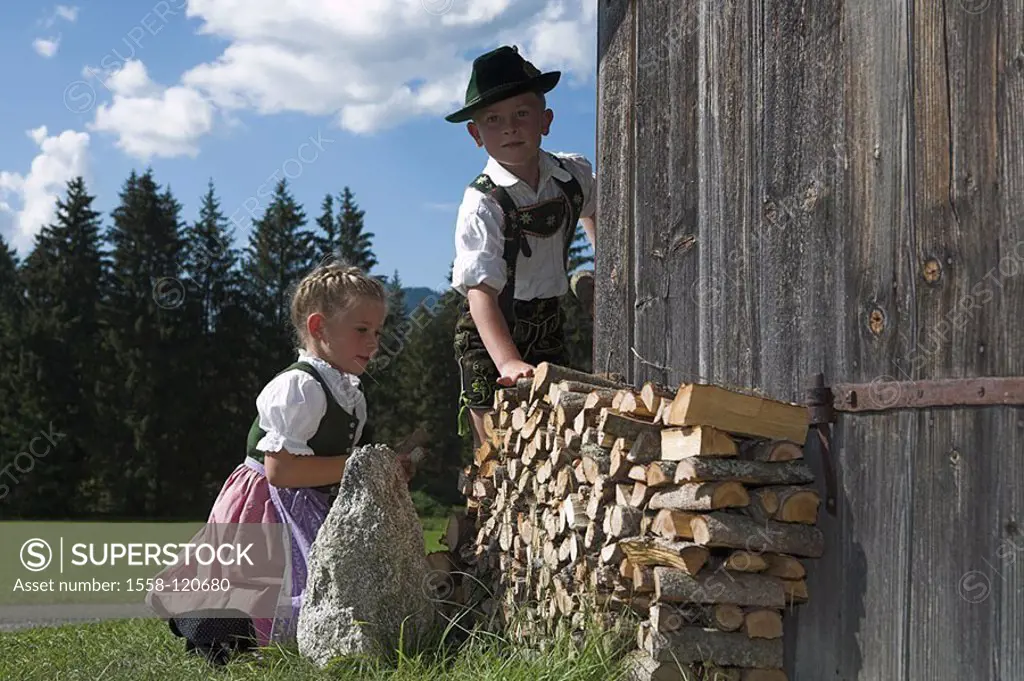 Wood-cottage, girls, boy, official dress, firewood, stacks, series, people, children, 5 years, 7 years, Dirndel, leather shorts, aspiration-hat, barns...