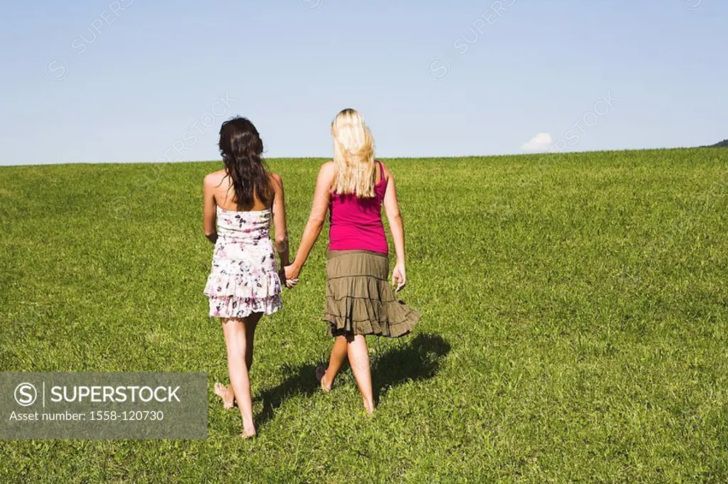 Teenagers, girls, barefoot, walk, meadow, hand in hand, back-opinion, series, people, 18-19 years, friends, long-haired, hair-color deceased, hands ho...