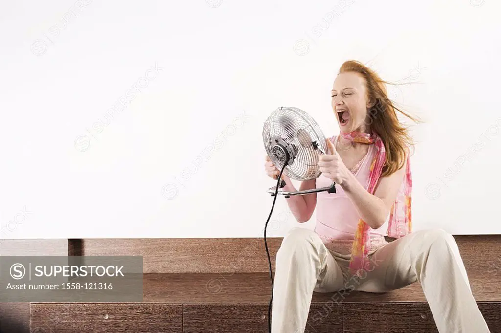 Woman, young, ventilator, yells holds, sideboard, sits, series, people, 20-30 years, scarf, enjoys scarf, long-haired, red-hairy, wind, air, heat temp...