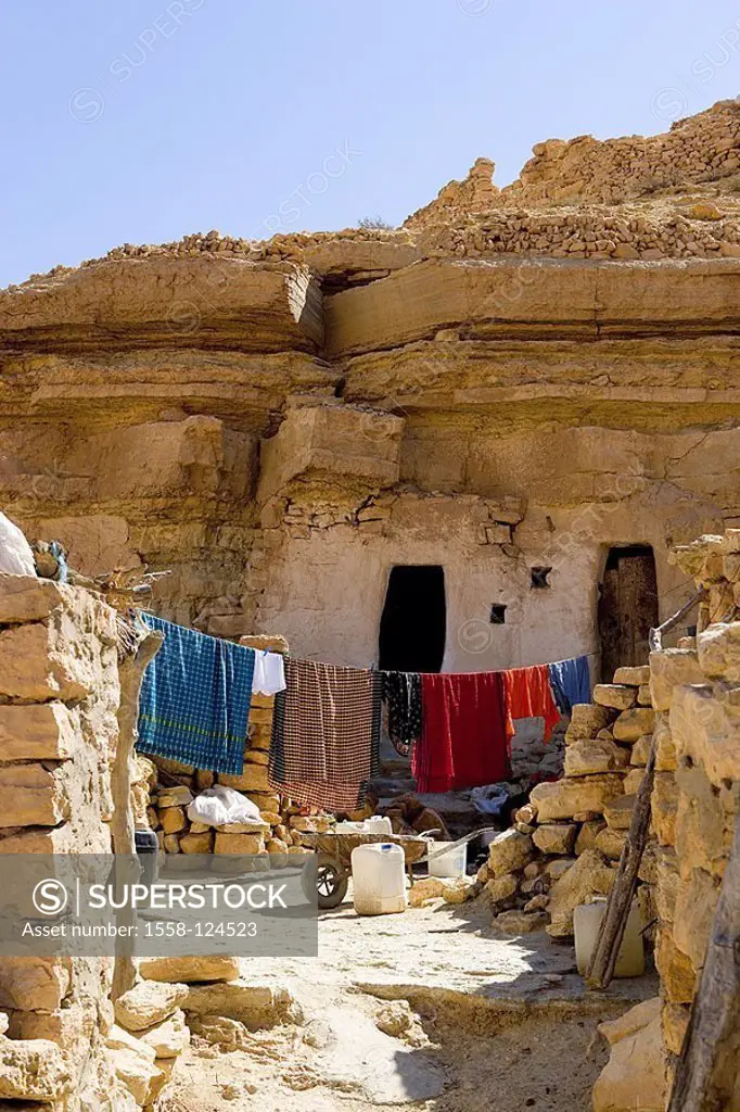 Tunisia, Chenini, dugout, forecourt, clothes line, South-Tunisia, mountains, Berber-village, rocks, apartments, caves, entrance, string, rope, laundry...