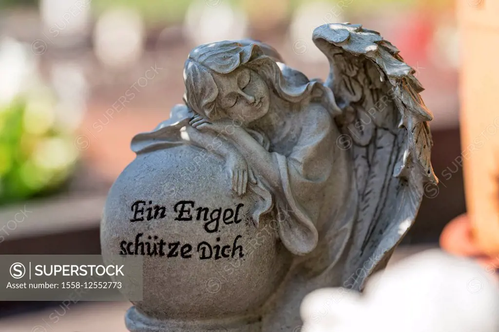 Angel figure, lettering, 'an angel protects you', gravestone, Heppenser cemetery, Wilhelmshaven, Lower Saxony, Germany,