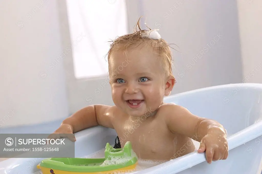 Sits toddler, baby-bathtub, laughs, cheerfully, detail, series, people, child, 10 months, child-bathtub, bathtub, toy, water, plays, splashes, joy, fu...