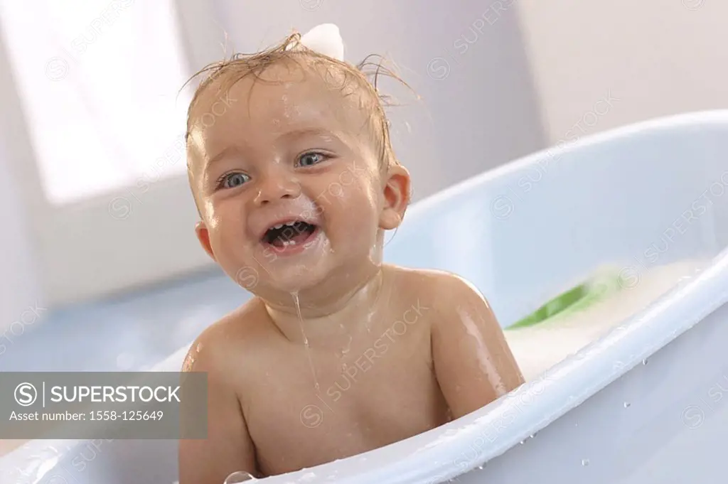 Sits toddler, baby-bathtub, laughs, cheerfully, detail, series, people, child, 10 months, child-bathtub, bathtub, water, plays, splashes, joy, fun, ch...