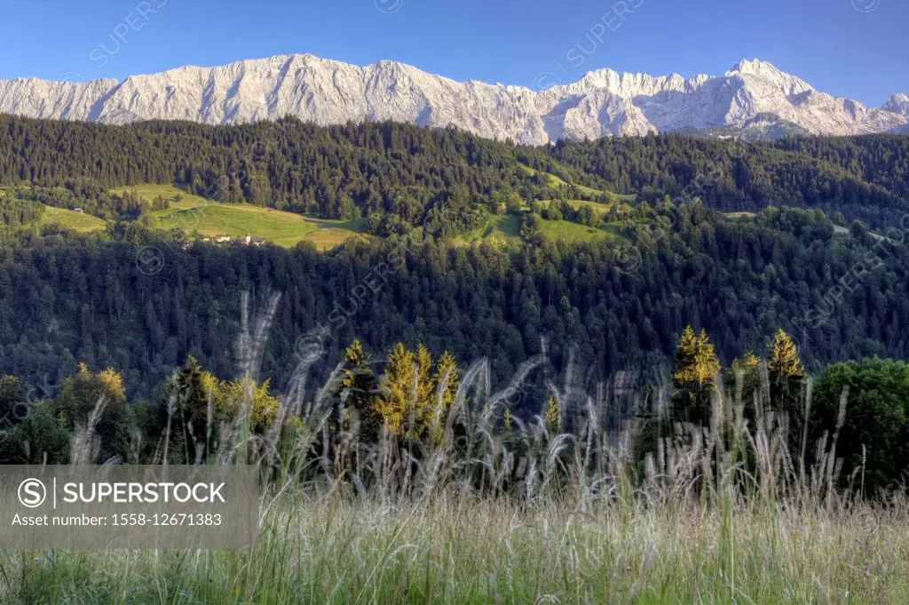 view from the Pfeifferalm alpe to the Wetterstein mountains with Alpspitze (2628m), Zugspitze (2962m) and Waxenstein (2277m), Garmisch-Partenkirchen, ...