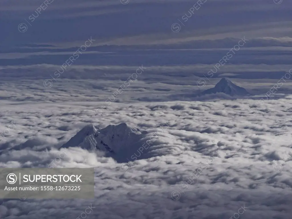 aerial view of clouds and mountain peaks