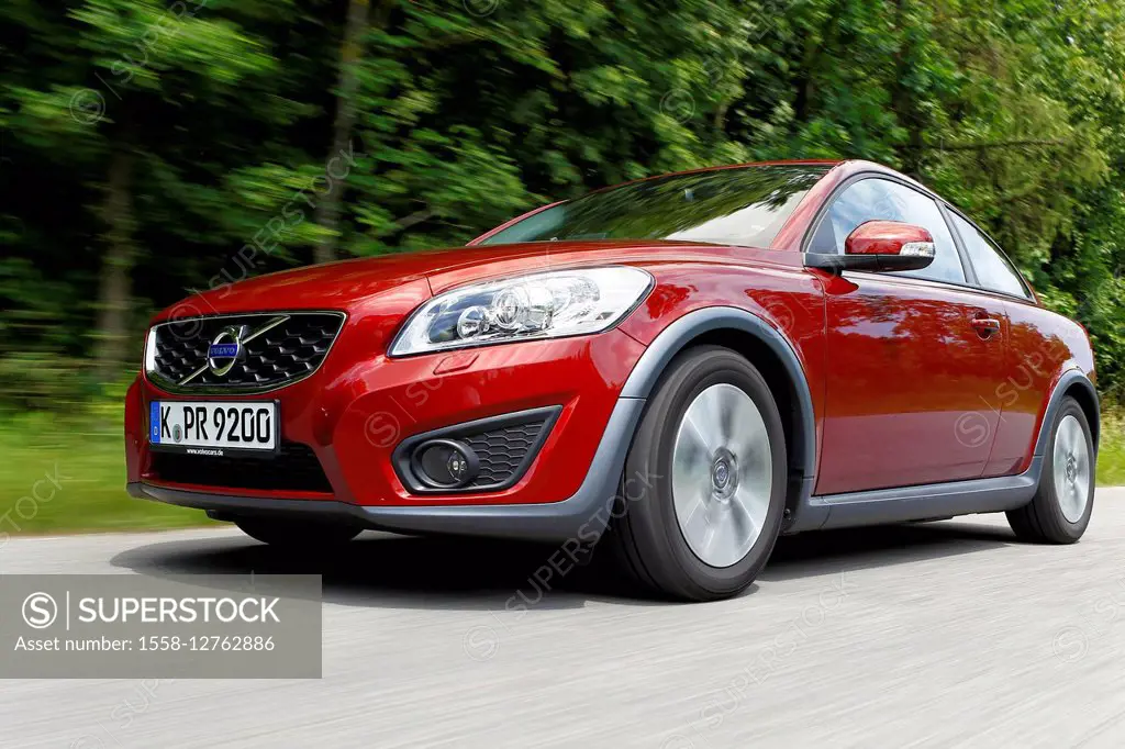 Car, Volvo C 30, red, panning on country road, frontal from below,