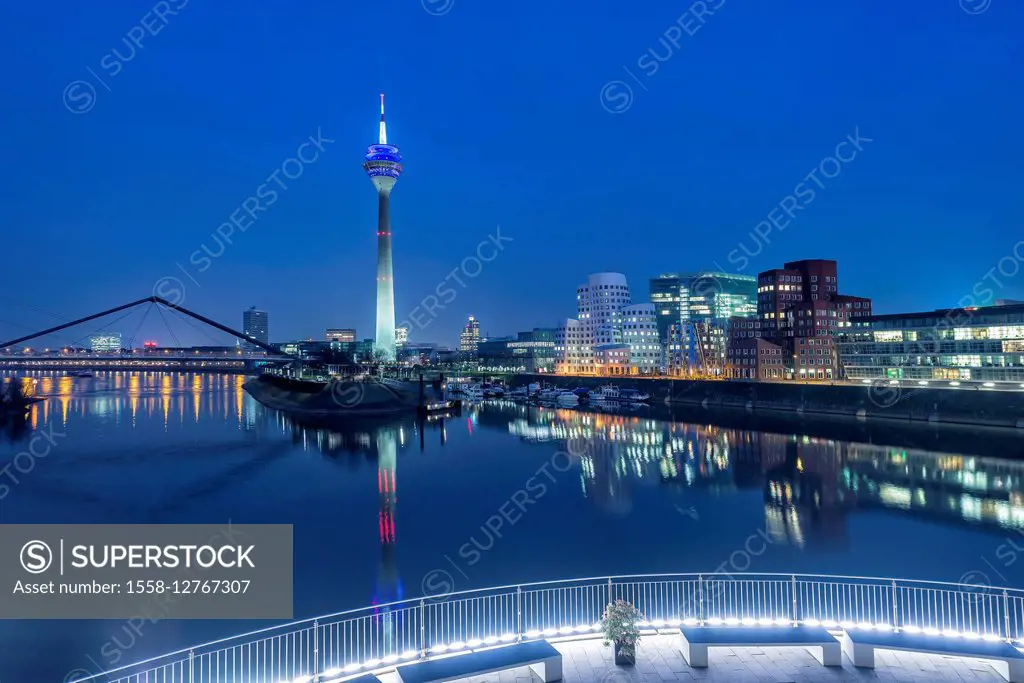 Düsseldorf, North Rhine-Westphalia, Germany, panorama of the media harbour with television tower and Gehry buildings at dusk