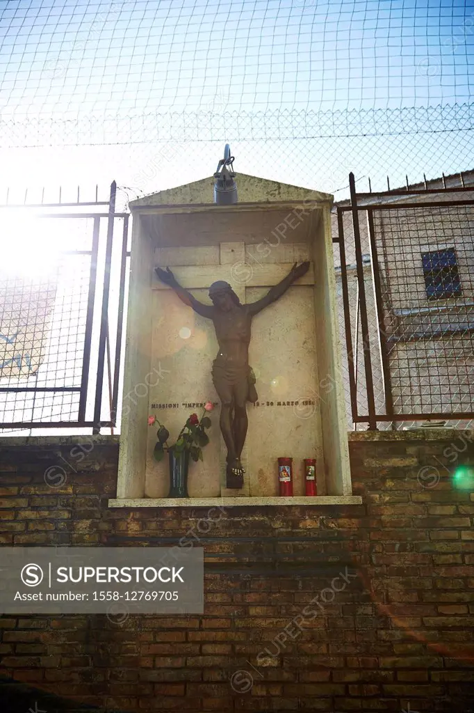 Statue of Christ on the cross, wayside cross, Rome, Italy