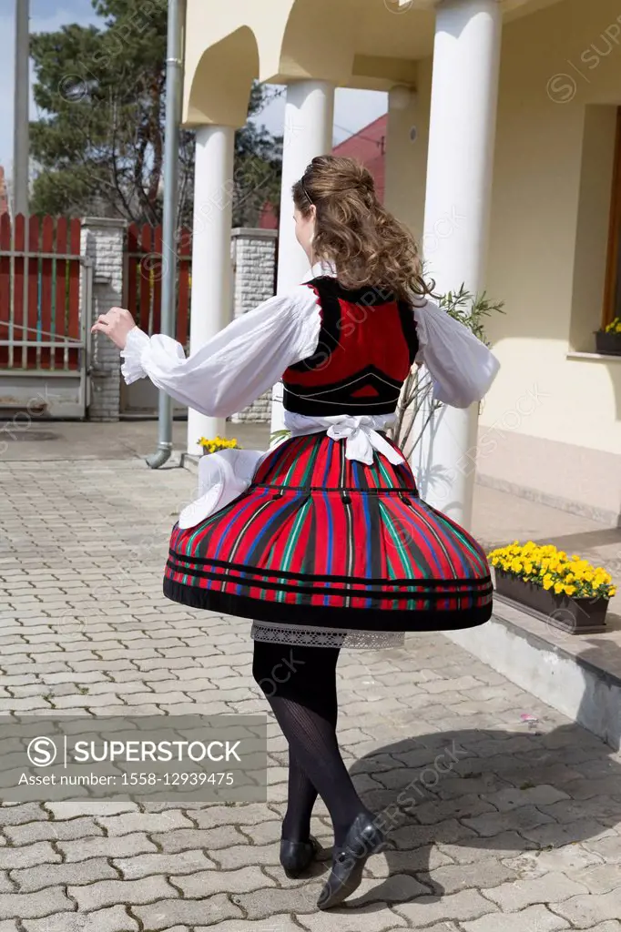 Young woman performing traditional dance, folklore dance, Budapest, Hungary