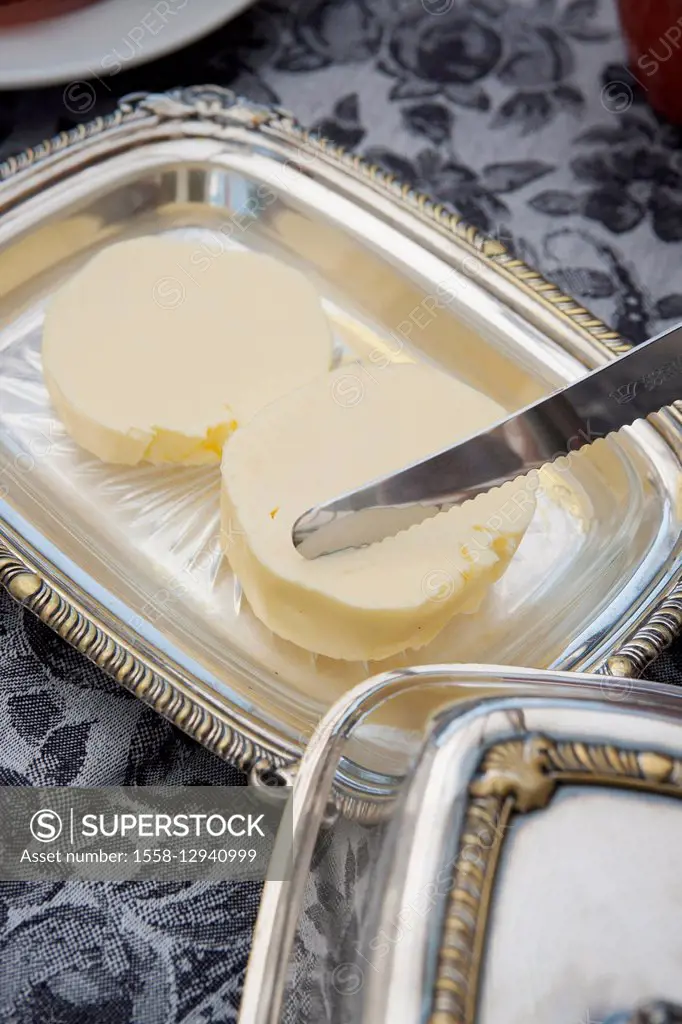 Butter in silver butter dish
