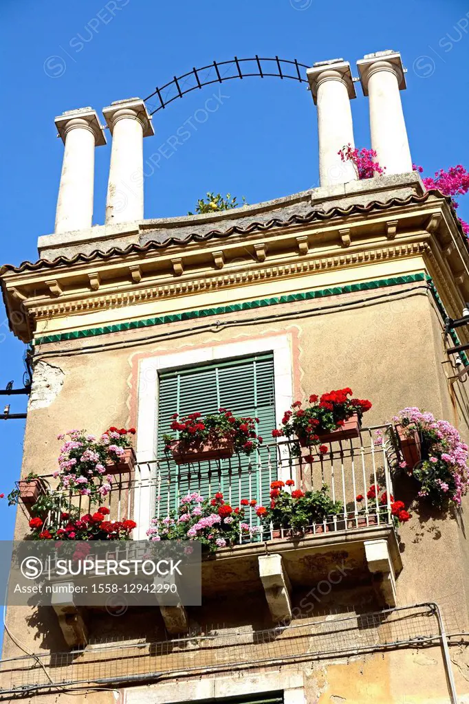 Taormina, typical house with planted balcony