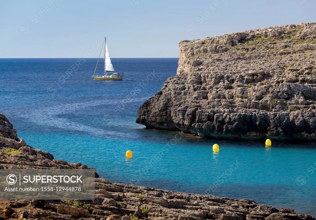 Sailing yacht at the Cala Binidali, island Menorca, the Balearic Islands, Spain