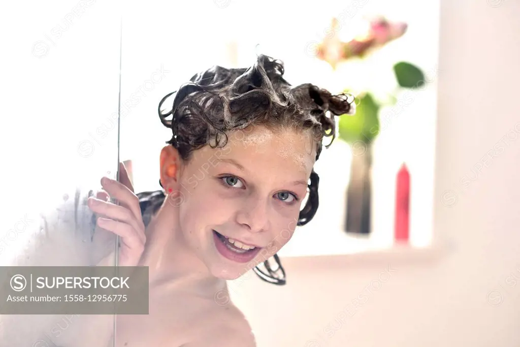 Girl, 10 years showering, washing hair, shampoo