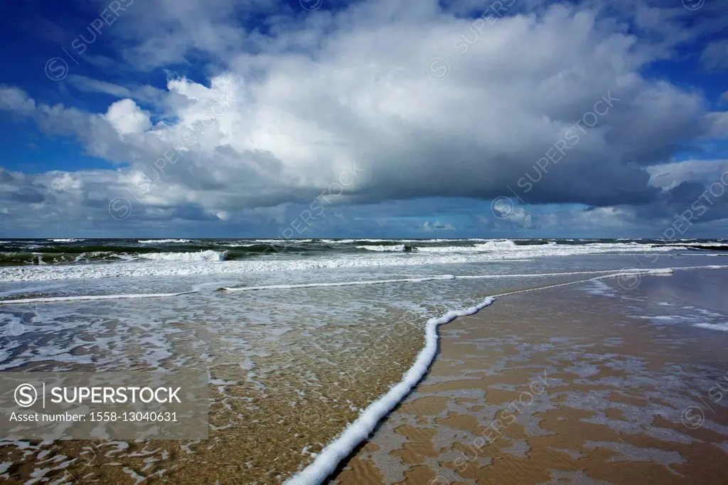 breakers under rain clouds on the beach of the North Sea close Wenningstedt (municipality) on the island of Sylt,