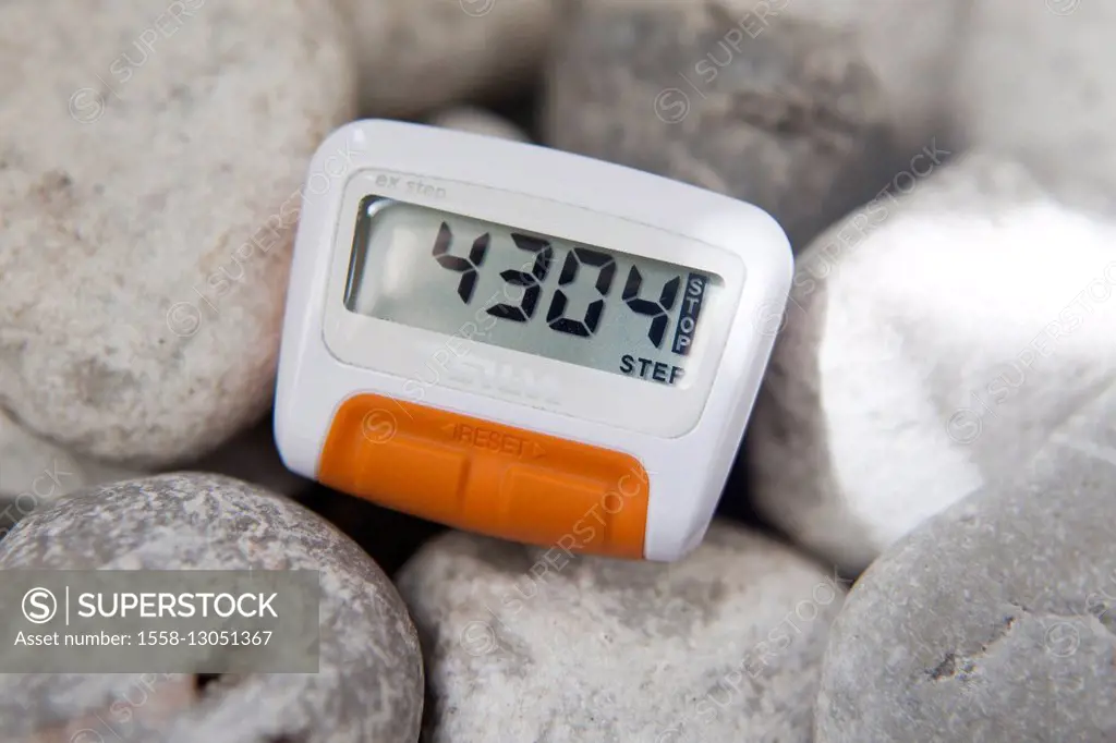 Step counter between stones, close-up,