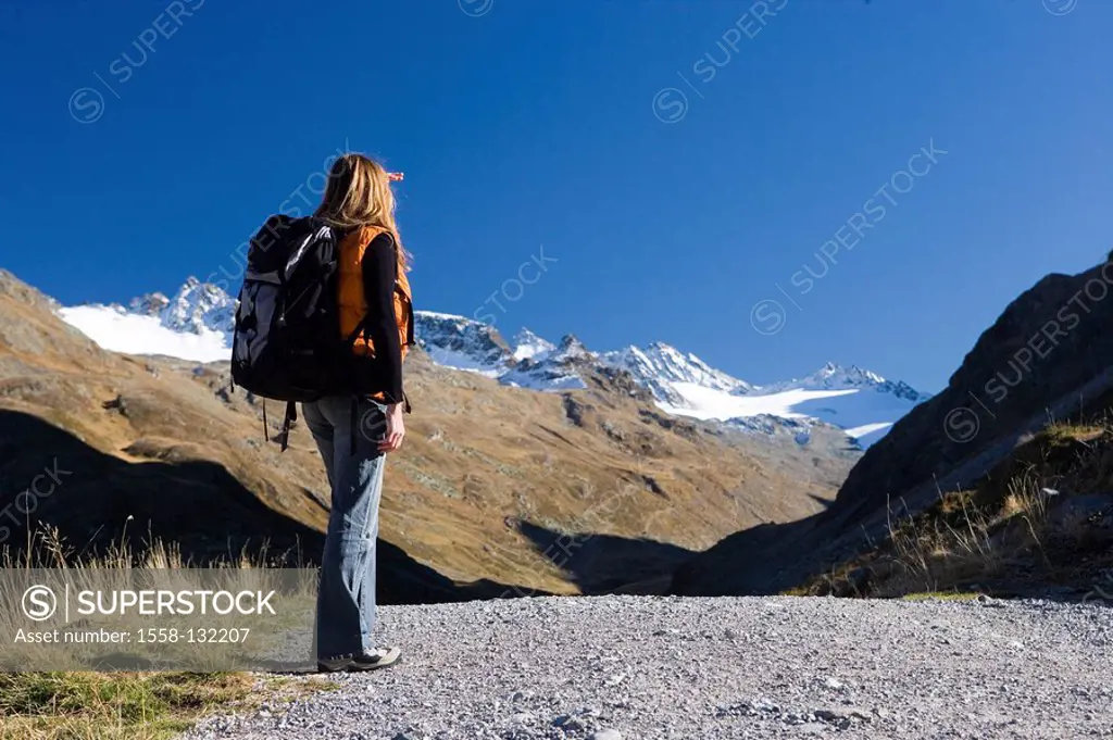 Austria, Vorarlberg, Montafon, Silvretta, woman, backpack, viewpoint, back view,