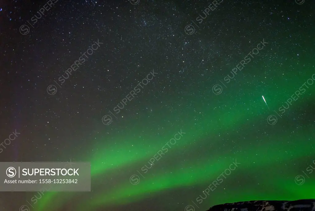 Northern Lights with shooting star in Iceland, Aurora borealis