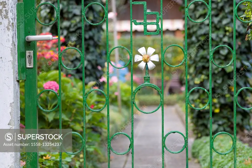Wrought-iron garden door in the allotment garden