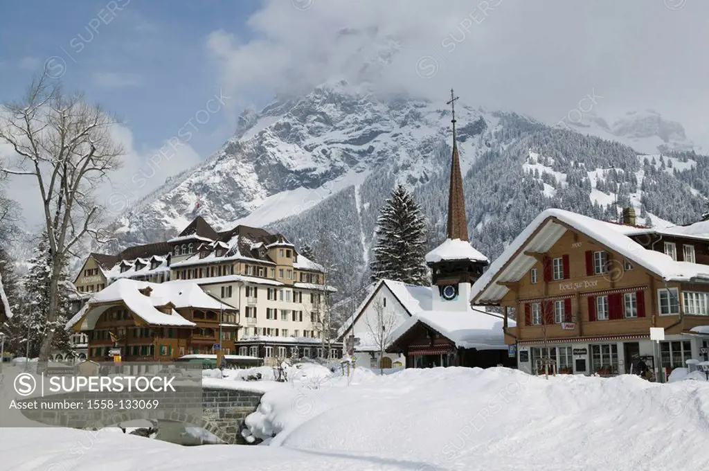 Switzerland, Kandertal, Kandersteg, locality perspective, church, mountain, winter, Frutigland, mountain-village, place, place-center, houses, bridge,...