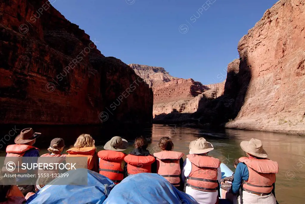 USA, Arizona, Grand Canyon, Colorado River, dinghy, tourists, back view, North America, mountain scenery, rocks, rockfaces, river, river bed, boat, Ra...