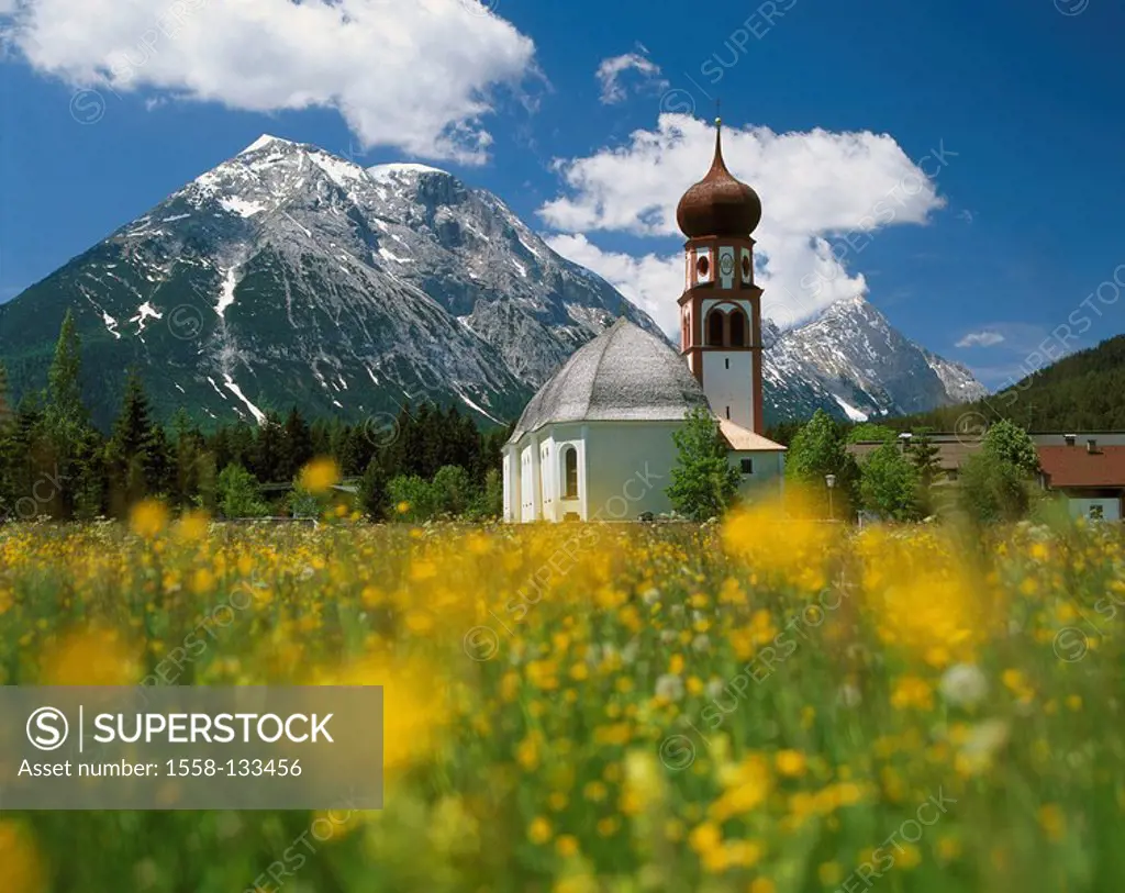 Austria, Tyrol, Leutasch, parish-church, high mouth, spring, Kirchplatzl, church, flower meadow, spring-meadow, dandelion, mountain scenery, clouded s...