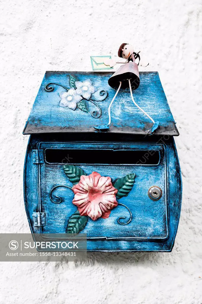 Blue painted mailbox