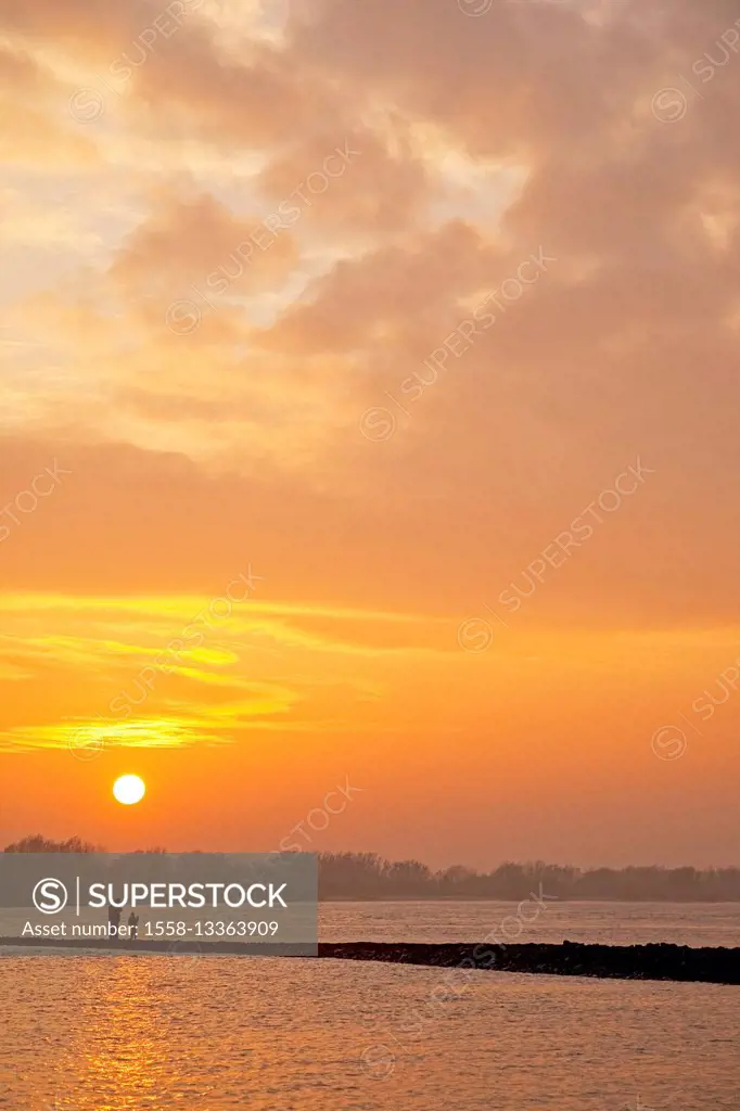 Sunset, river, the Elbe, people