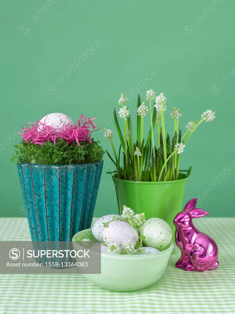 Easter bunny with flowers, Easter basket and eggs
