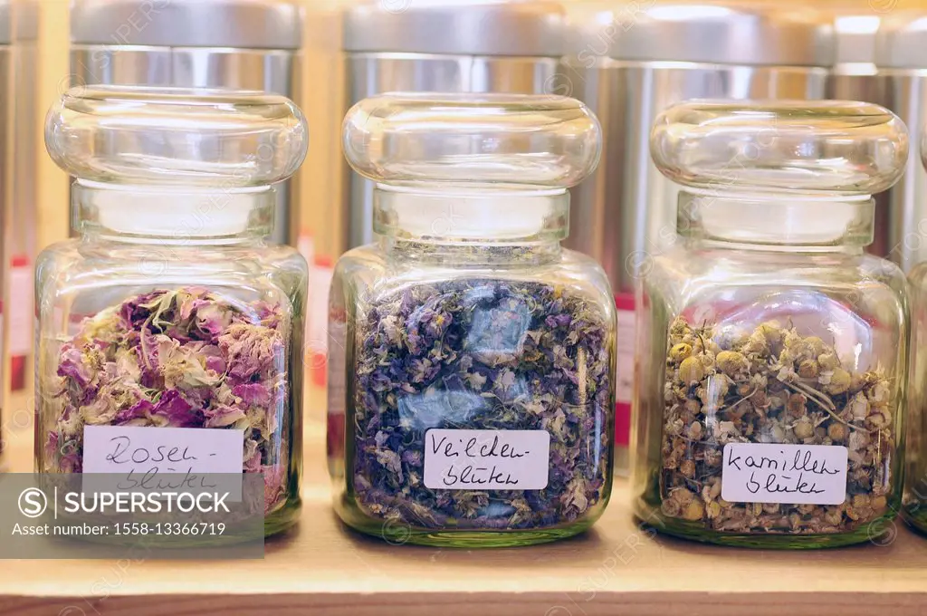 Rose blossoms, camomile blossoms, violet blossoms, dried petals, glass jars