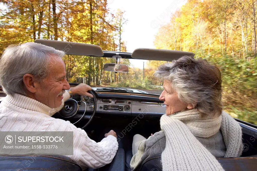 Forest, car, Cabrio, senior couple, back view, drives eye contact, happily, falling in love, autumn, pension, people, 66 years, 60-70 years, seniors, ...