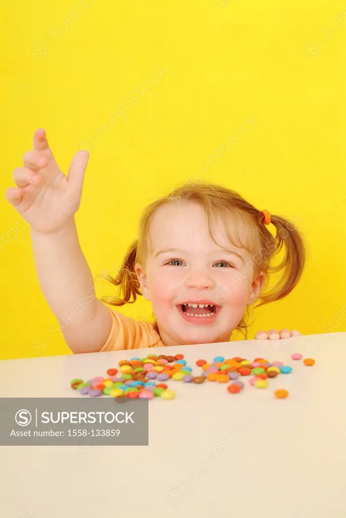 Laugh child, girl, candies, cheerfully, gesture,