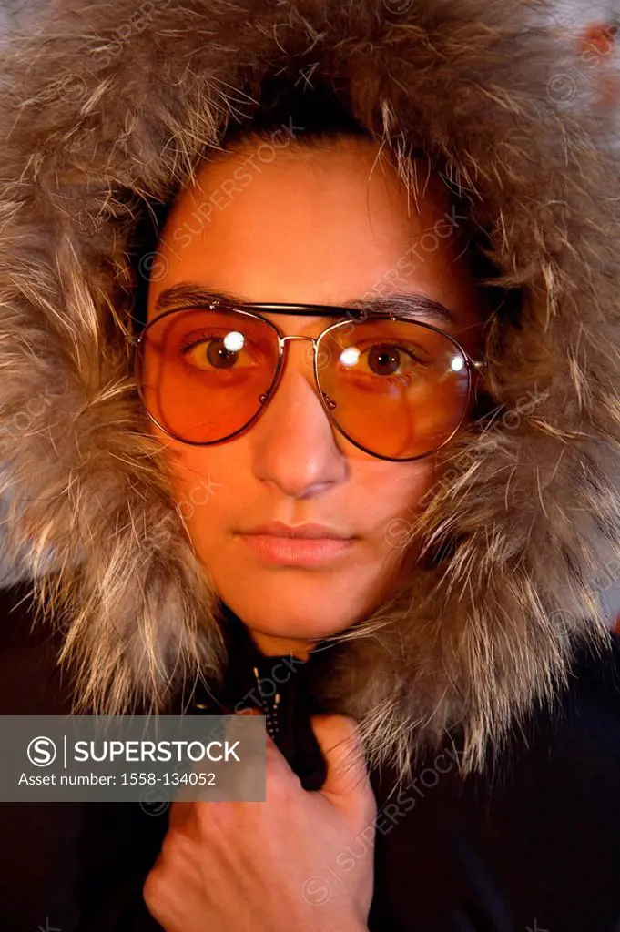 Woman, young, seriously, winter-jacket, hood, fur-collars, keeps closed, sun glass, portrait, people, girl, 16-20 years, 20-30 years, winter-clothing,...