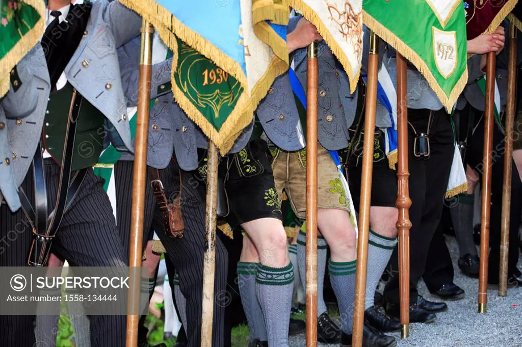 Germany, Bavaria, Fischbachau, birch-stone, Feast of Corpus Christi-day, pilgrims, men, official dress, detail, legs, flags, Upper Bavaria, Leitzachta...