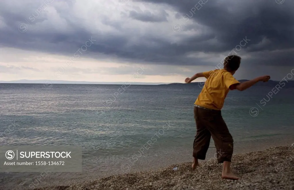 Beach, boy, back view, stone, people, tosses child, teenagers leisurewear childhood 13 years vacation, leisure time, vacation, fun, game, fury, anger,...