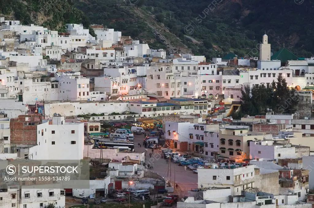 Morocco, Moulay Idriss, city view, city, place of pilgrimage, houses, residences, buildings, architecture, building sites, tower, minaret, lights, twi...